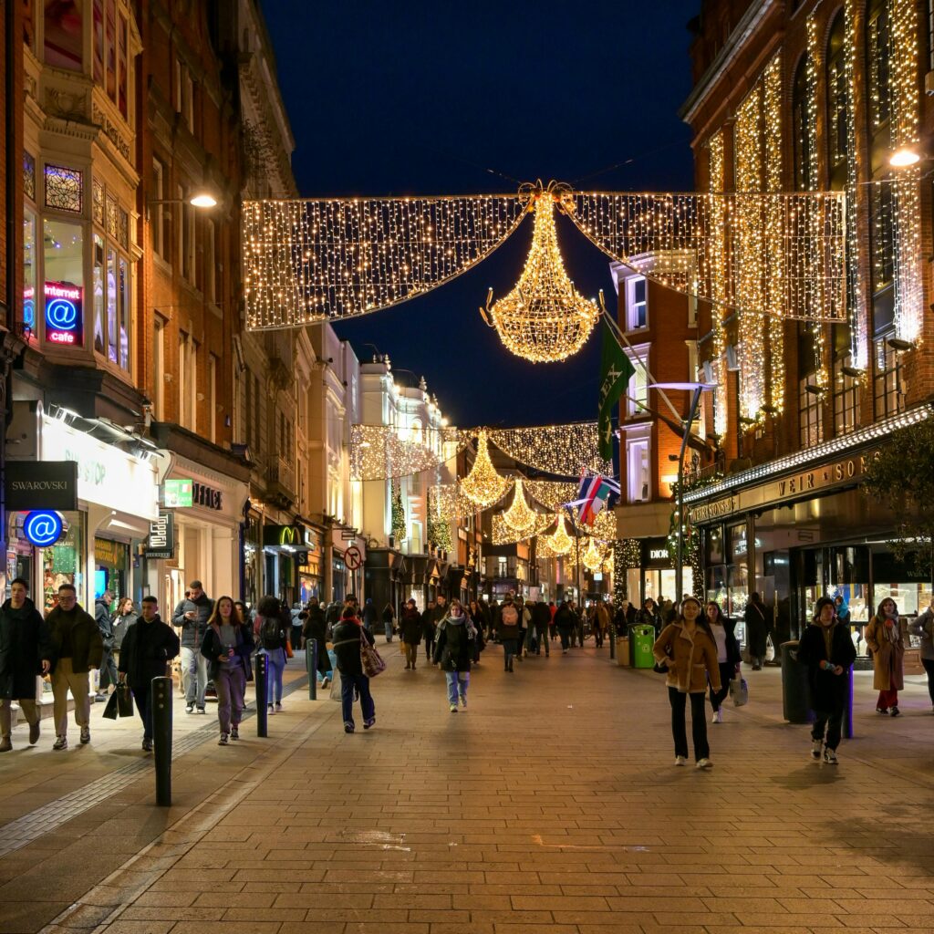 pexels photo 29545950 29545950 A bustling Grafton Street in Dublin with festive holiday lights and evening shoppers.